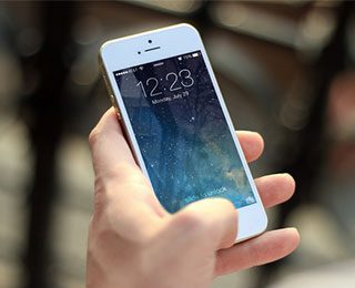 iPhone Held on a Hand