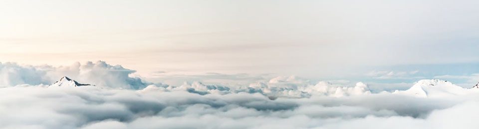 Bright Sky With Clouds and Alps